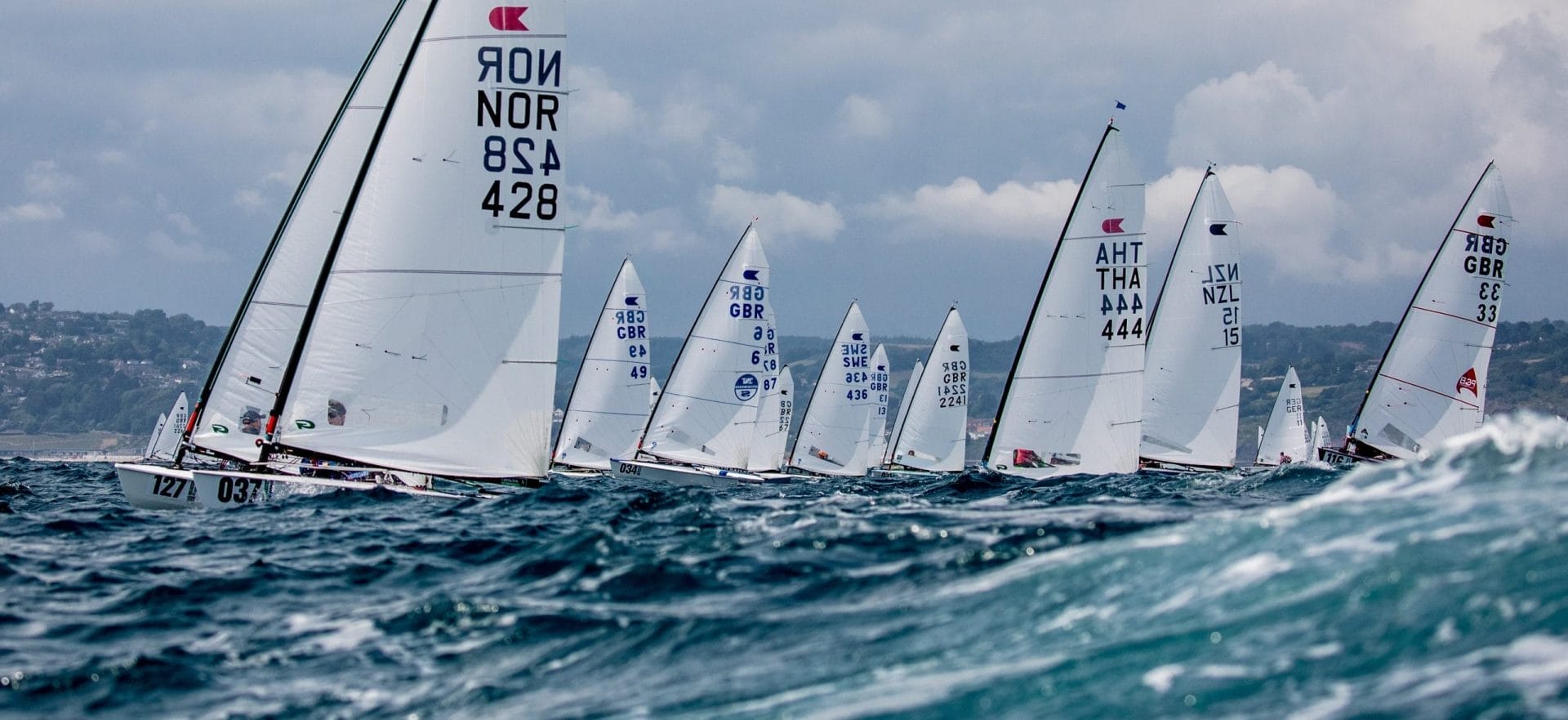 Boats sailing in Dinghy-Worlds-Lyme-Regis event.