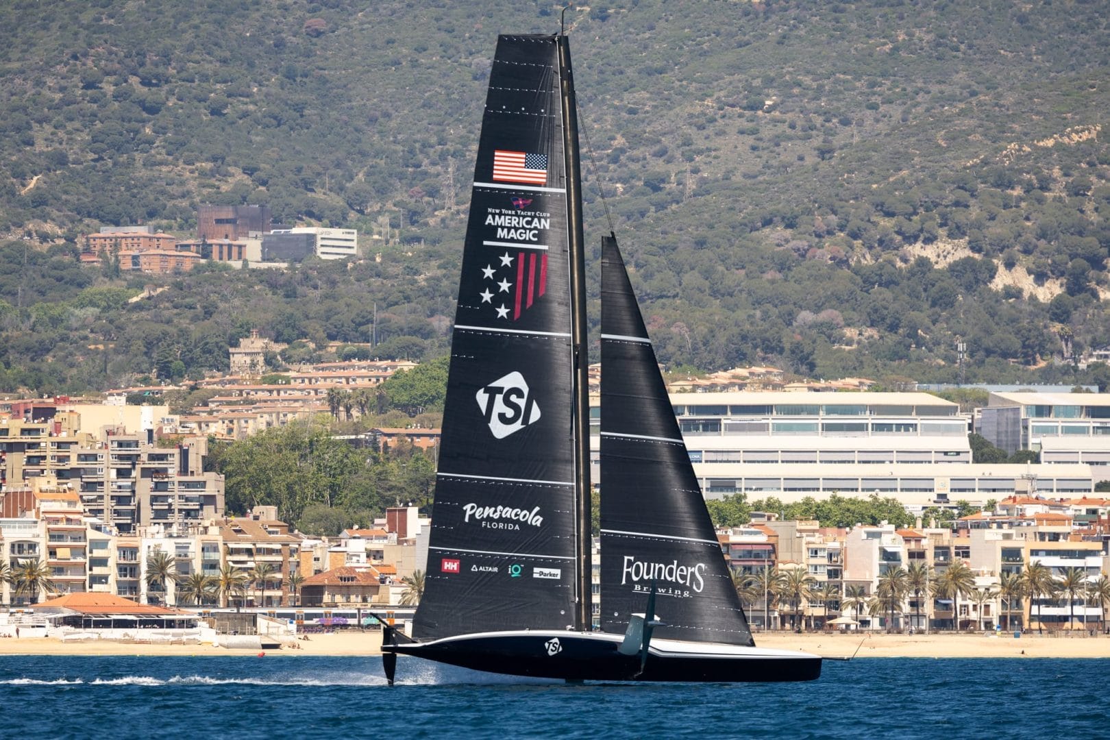 Black Racing boat - G AM PATRIOT BCN Cloud Waves AIL